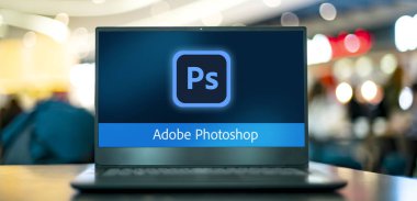 POZNAN, POL - 16 Ocak 2022: Adobe Inc. tarafından geliştirilen ve yayımlanan bir raster grafik editörü olan Adobe Photoshop 'un logosunu gösteren dizüstü bilgisayar