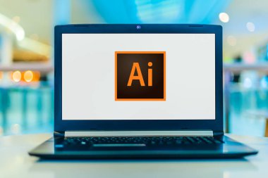 POZNAN, POL - 22 Şubat 2020: Adobe Inc. tarafından geliştirilen ve pazarlanan bir vektör grafik editörü olan Adobe Illustrator 'un logosunu gösteren dizüstü bilgisayar