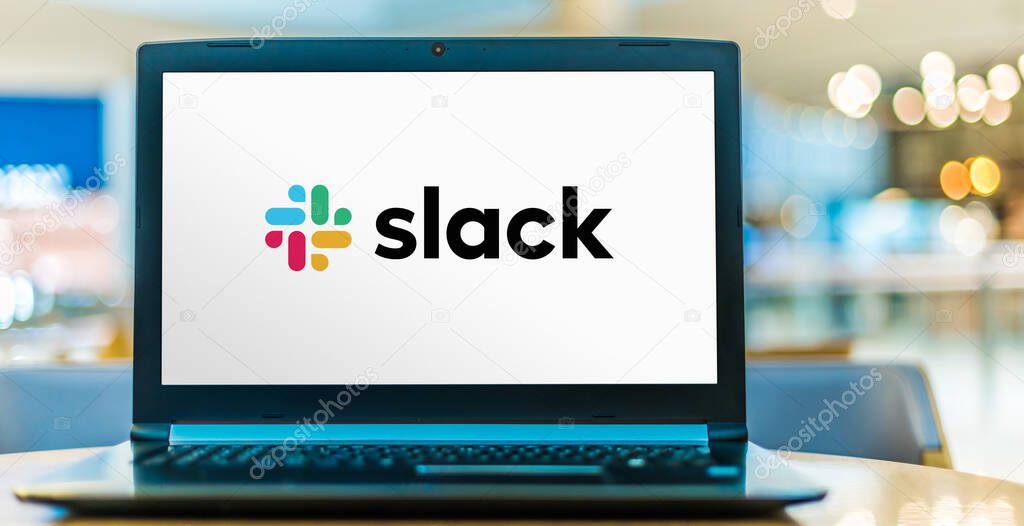 POZNAN, POL - SEP 23, 2020: Laptop computer displaying logo of Slack, a proprietary business communication platform developed by American software company Slack Technologies