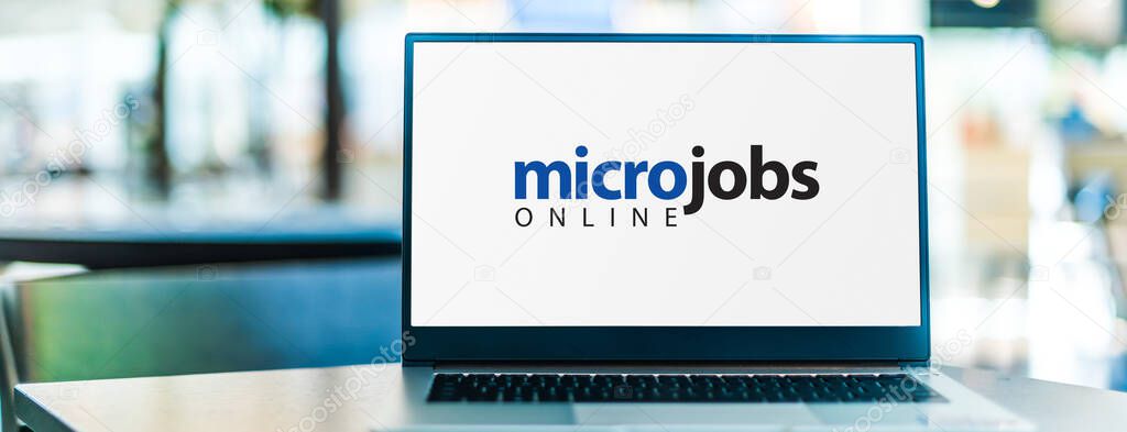 Laptop computer displaying the sign 