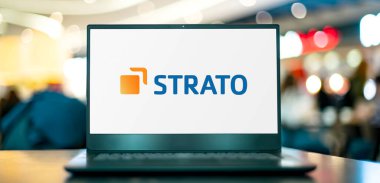 POZNAN, POL - FEB 25, 2022: Laptop computer displaying logo of Strato AG, an internet hosting service provider headquartered in Berlin, Germany