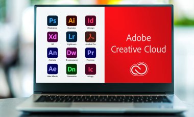 POZNAN, POL - NOV 24, 2021: Laptop computer displaying logo of Adobe Creative Cloud, a set of applications and services from Adobe Systems