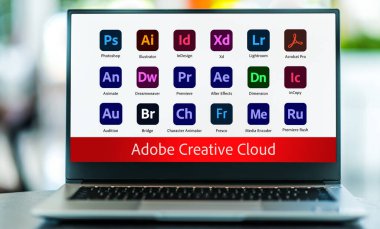 POZNAN, POL - NOV 24, 2021: Laptop computer displaying logo of Adobe Creative Cloud, a set of applications and services from Adobe Systems
