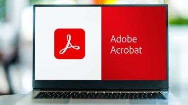 POZNAN, POL - SEP 22, 2021: Laptop computer displaying logo of Adobe Acrobat, a family of application software and Web services developed by Adobe Inc.