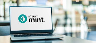 POZNAN, POL - SEP 23, 2020: Laptop computer displaying logo of Mint or Intuit Mint, a personal financial management website and mobile app for the US and Canada produced by Intuit, Inc