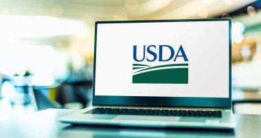 POZNAN, POL - MAY 1, 2021: Laptop computer displaying logo of USDA, the federal executive department responsible for developing and executing federal laws related to farming, forestry and food