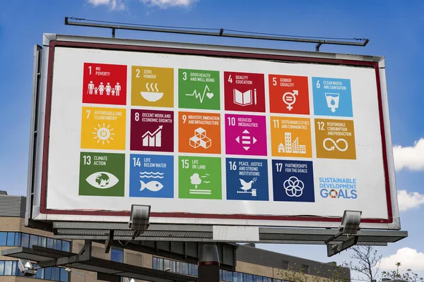 POZNAN, POL - MAY 1, 2022: Advertisement billboard displaying logo of The Sustainable Development Goals, a collection of 17 interlinked global goals set up in 2015 by the United Nations General Assembly