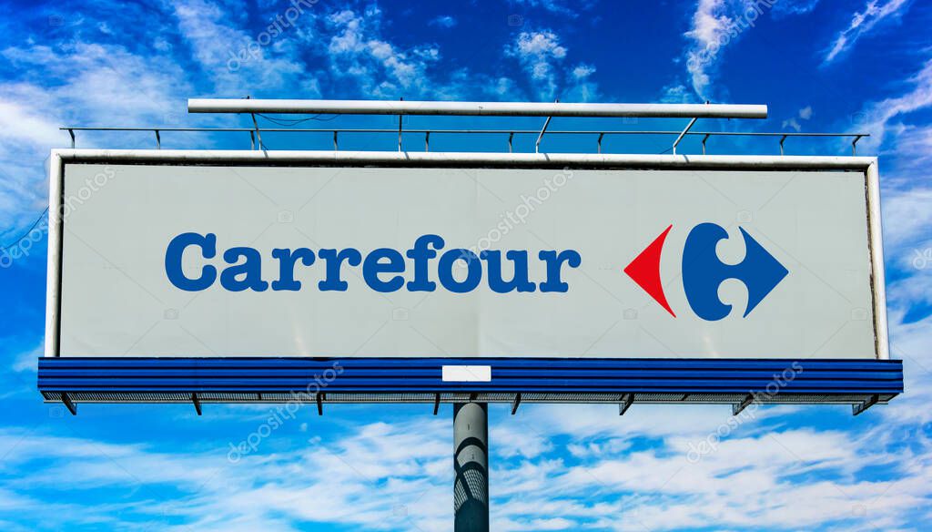 POZNAN, POL - MAY 1, 2022: Advertisement billboard displaying logo of Carrefour, a French multinational corporation specialized in retail