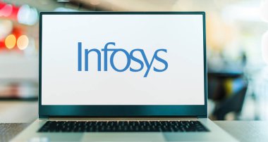 POZNAN, POL - APR 7, 2022: Laptop computer displaying logo of Infosys, an Indian multinational corporation that provides business consulting, information technology and outsourcing services
