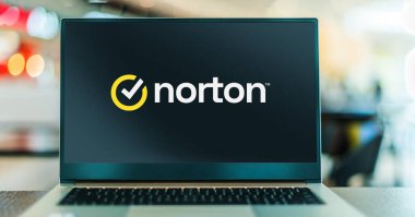 POZNAN, POL - APR 7, 2022: Laptop computer displaying logo of Norton AntiVirus, an anti-virus or anti-malware software product, developed and distributed by Symantec Corporation