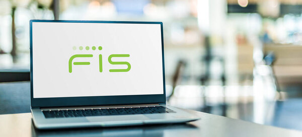 POZNAN, POL - NOV 12, 2020: Laptop computer displaying logo of FIS an American company which offers a wide range of financial products and services
