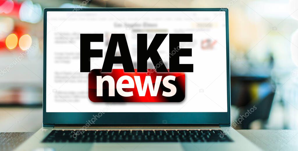 Laptop computer displaying the sign of 'Fake news'.