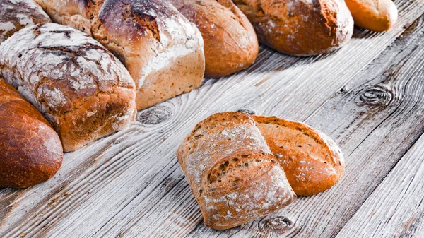 Samenstelling Met Diverse Bakkerijproducten Houten Tafel — Stockfoto