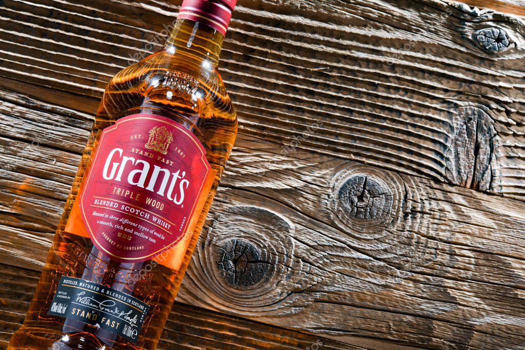 POZNAN, POL - APR 13, 2022: Bottle of Grant's whisky, the oldest family-owned blended whisky, bottled by William Grant & Sons in Scotland, currently sold in over 180 countries.
