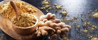 Zemin zencefilli bir kase ve taze rhizomu.