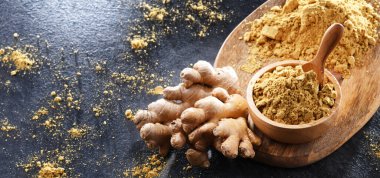 Zemin zencefilli bir kase ve taze rhizomu.