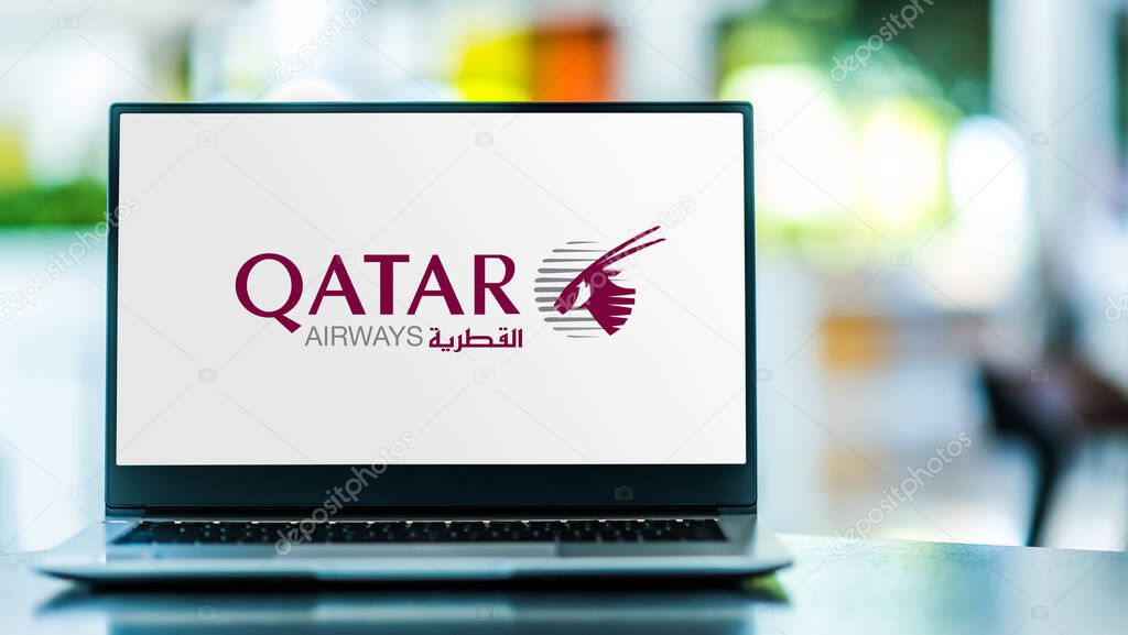 POZNAN, POL - MAR 15, 2021: Laptop computer displaying logo of Qatar Airways, the state-owned flag carrier of Qatar, headquartered in Doha