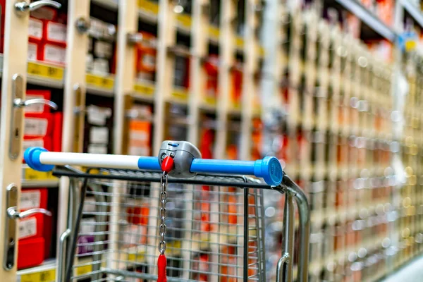 A shopping cart in a home improvement store.