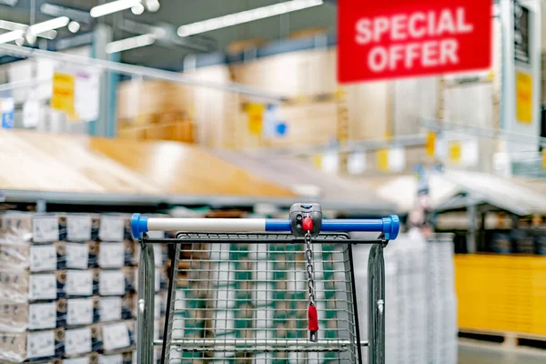 A shopping cart in a home improvement store.