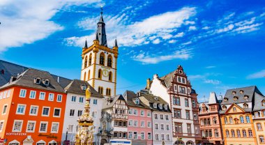 TRIER, GERMANY - AUG 4, 2022: Monumental architecture of Trier main market with St. Gangolf's Church, in the state of Rhineland-Palatinate, Germany