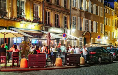 METZ, FRANCE - AUG 5, 2022: Restaurants in the Old Town of Metz in the night