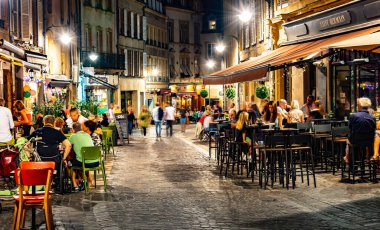 METZ, FRANCE - AUG 5, 2022: Restaurants in the Old Town of Metz in the night