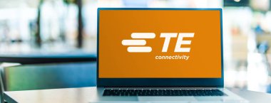POZNAN, POL - AUG 2, 2022: Laptop computer displaying logo of TE Connectivity, an American Swiss-domiciled technology company that designs and manufactures connectors and sensors