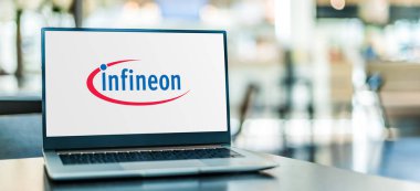 POZNAN, POL - AUG 2, 2022: Laptop computer displaying logo of Infineon Technologies, a German semiconductor manufacturer founded in 1999
