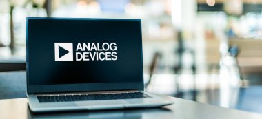 POZNAN, POL - AUG 2, 2022: Laptop computer displaying logo of Analog Devices, an American semiconductor company specializing in data conversion, signal processing and power management technology