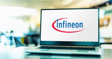 POZNAN, POL - AUG 2, 2022: Laptop computer displaying logo of Infineon Technologies, a German semiconductor manufacturer founded in 1999