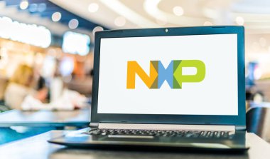 POZNAN, POL - AUG 2, 2022: Laptop computer displaying logo of NXP Semiconductors, an American Dutch semiconductor designer and manufacturer with headquarters in Eindhoven, Netherlands