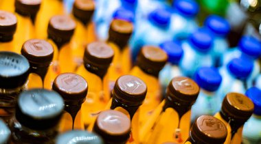 FRANKFURT, GERMANY - AUG 27, 2022: Bottles of cold drinks put out for sale in a commercial refrigerator
