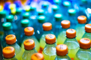 FRANKFURT, GERMANY - AUG 27, 2022: Bottles of cold drinks put out for sale in a commercial refrigerator