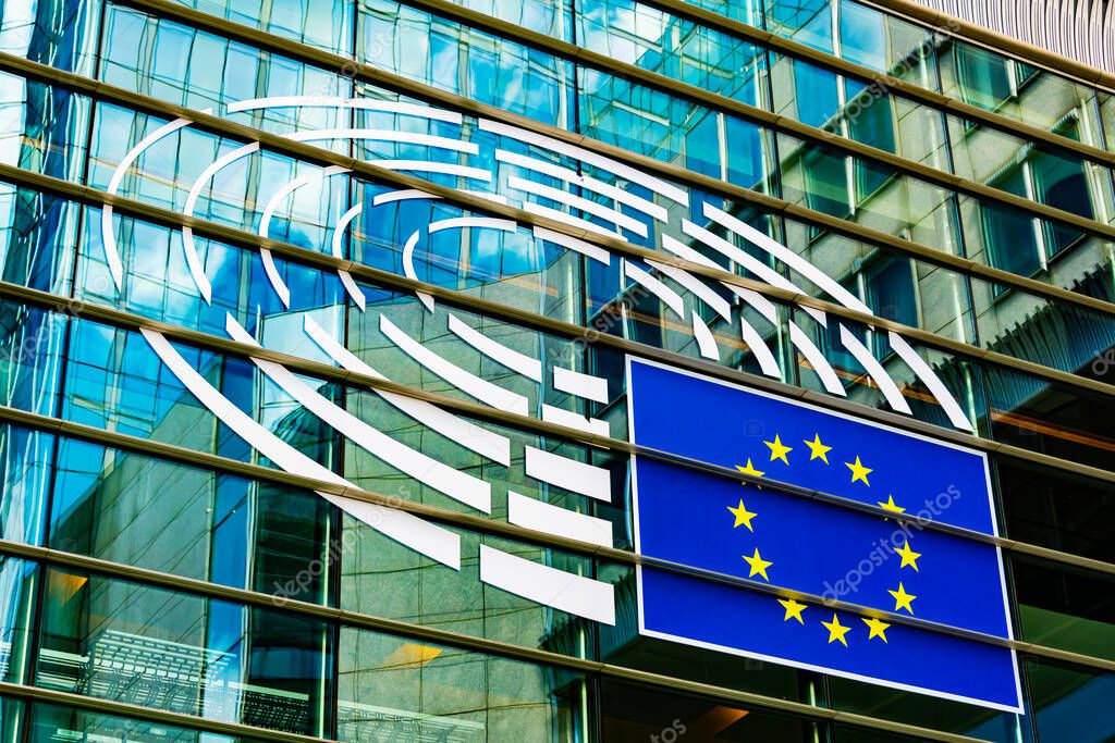 BRUSSELS, BELGIUM - AUG 20, 2022: Logo of European Parliament, displayed on the Paul-Henri Spaak building in Brussels, Belgium