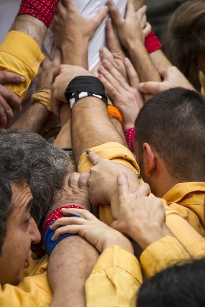 Castellers, brazos que sostienen la torre — Foto de Stock