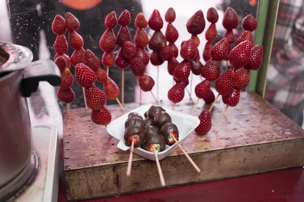 Strawberry with chocolate on stick — Stock Photo, Image