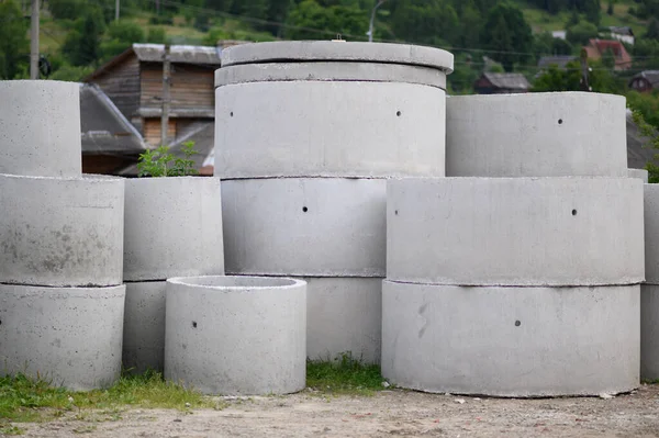 Concrete rings for the well and sewer are in stock. Concrete products for construction.