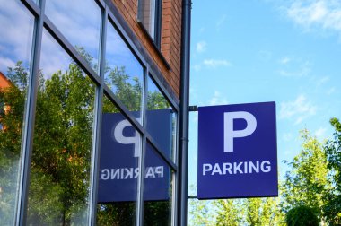 Parking sign on a modern shopping mall.