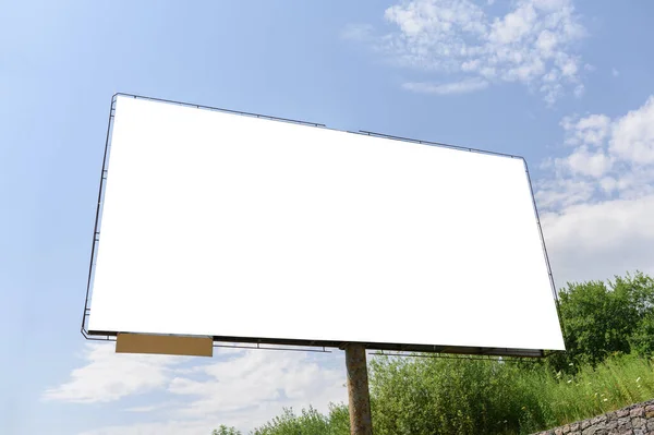 Billboard white blank with room to add your own text. Background with white cloud for advertising.