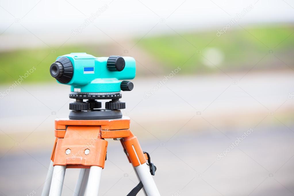 Surveying equipment theodolite during road works