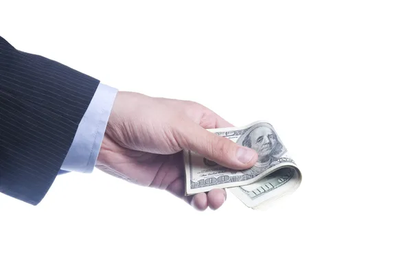 Мужская рука держит пачку долларов — стоковое фото