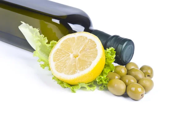 Olijven en olijfolie fles Stockafbeelding