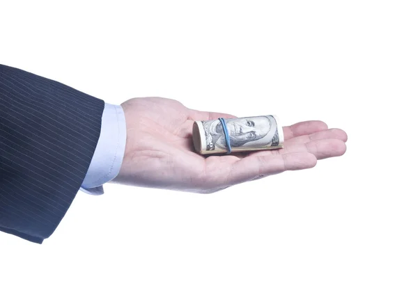 Man's Hand With a Roll Of Dollars — Stock Photo, Image