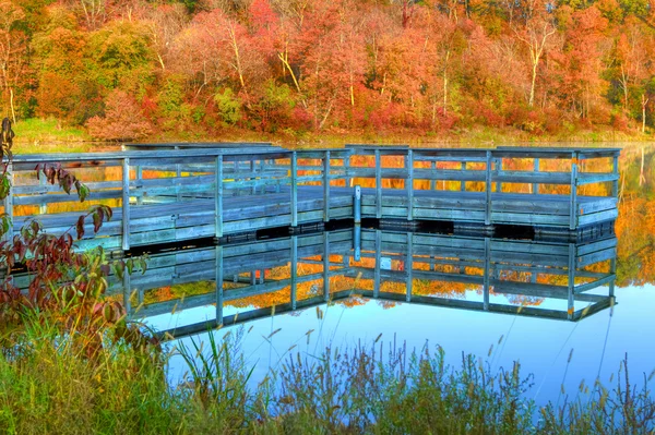 High Dynamic Range of a boat dock and fall colors — Stock Photo, Image