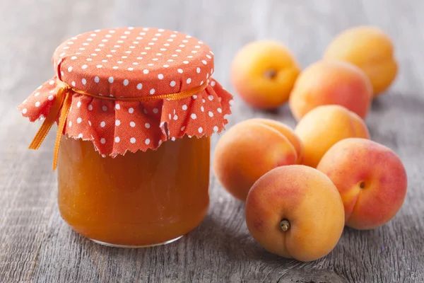 Apricot jam and fresh fruits — Stock Photo, Image