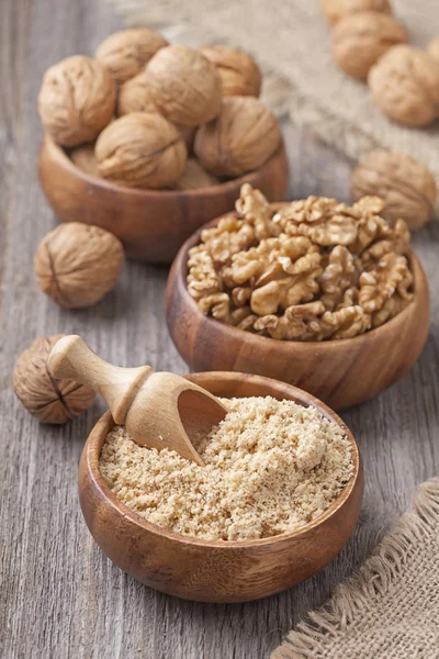 Walnuts in wooden bowls — Stock Photo, Image