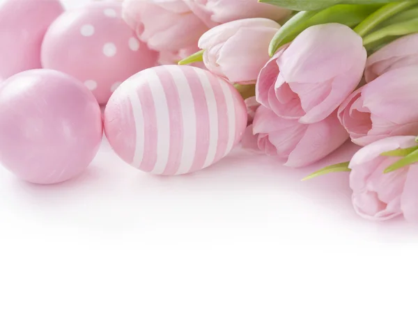 Pink easter eggs and tulips Stock Photo