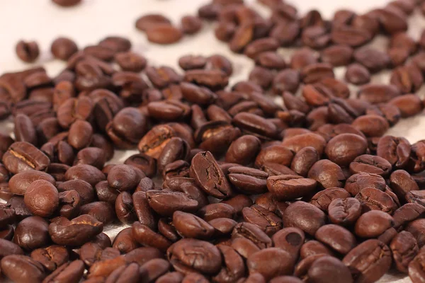 Coffee beans on traditional sack textile — Stock Photo, Image