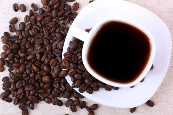 Šálek horké nápoje káva paprskem — Stock fotografie