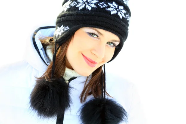 Smiling beautiful girl portrait in winter time with snow. Royalty Free Stock Photos